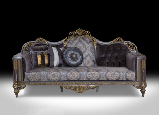 Sofa am klassesche Stil mat Chesterfield-Design fir d'Wunnzëmmer.