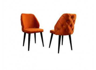 Gepolsterte Holzstull orange Chesterfield op schwaarze Been d'Iesszëmmer