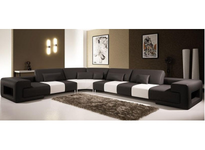 Stiilvollen Design an héchstem Komfort mat eisem grousse L-förmleche Ecksofa.