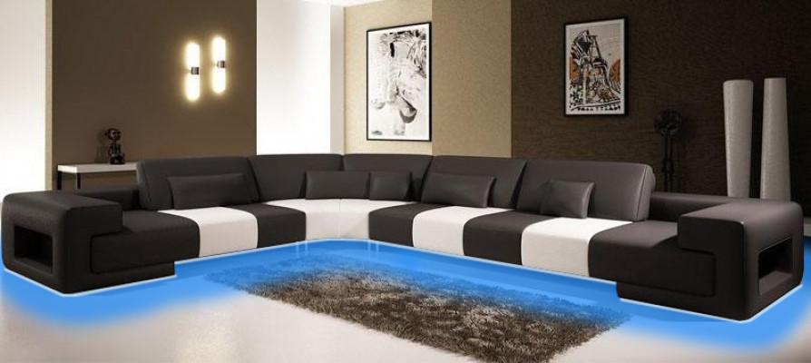 Stiilvollen Design an héchstem Komfort mat eisem grousse L-förmleche Ecksofa.