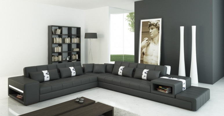 Modernt Wunngefill L-fërmegt Eckcouch am Donkelgrou mat stilvoller Kënschtleederpolsterung.
