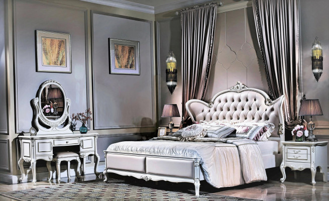 Kingsize-Duebbelbett mat Ledekappdeel am klasseschen Design Chesterfield-Stil