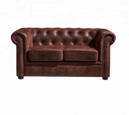 Luxuriéist Chesterfield-Sofa aus Kënschtlieder fir d'Wunnzëmmer