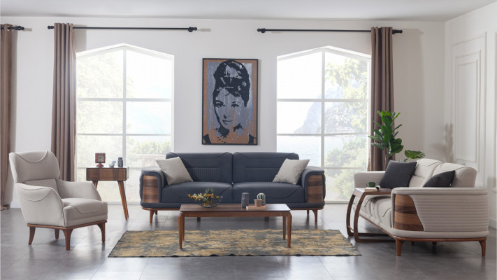 Zwee donkelgrou Sofasen am moderne Stil mat Holzbeen fir e Wunnzëmmer.