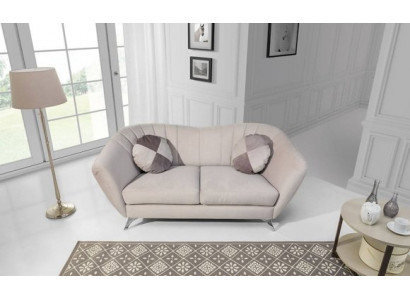 D'2-Sëtz-Sofa an engem elegante a modernen Stil passt perfekt an all Interieur.