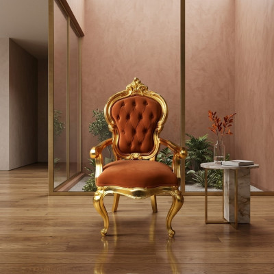 Elegante Barockstull am originale orangefaarwege Faarftoun mat glänzende gëllfaarwege Stëtzen.