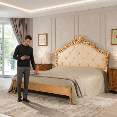 Neit luxuriéist Chesterfield-Doppelbett mat geschnëtzten Kopfdeel.