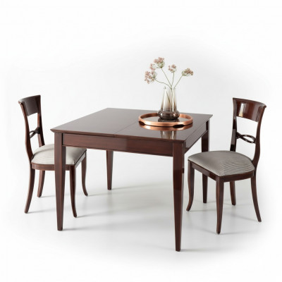 Elegante Iessdësch mat Stull an donkebraunem Faarf mat glänzender Uewerfläch.
