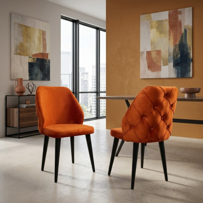 Gepolsterte Holzstull orange Chesterfield op schwaarze Been d'Iesszëmmer