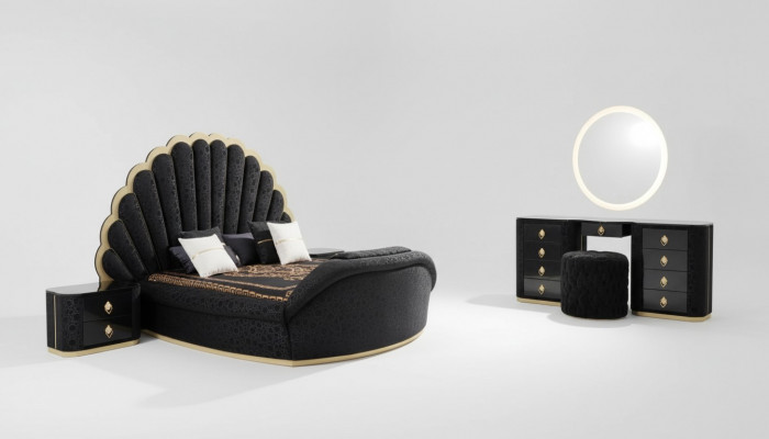 Modern luxuriéis Schlofzëmmermiwwel aus héichwäertegem Stoff a stabilem Holz.
