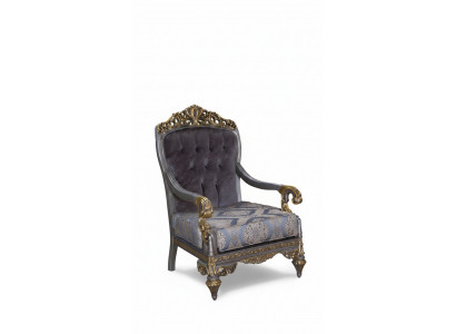 Elegante klassesch Sëtz mat dekorativen Musteren am Chesterfield-Design.