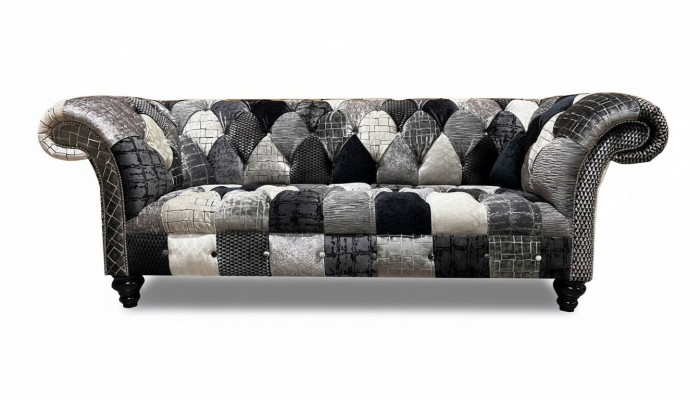 Luxuriéis Samettsofa am Chesterfield-Design mat faarwege Karos