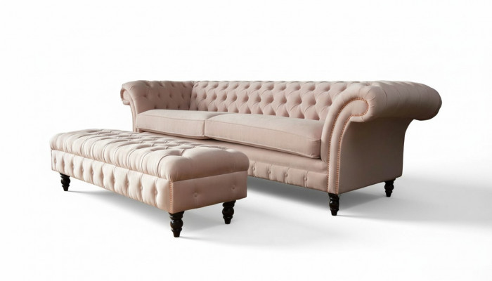 Eng luxuriéis, rosa véiersëtzeger Canapé am Chesterfield-Design, inklusiv Sëtzkëssen.