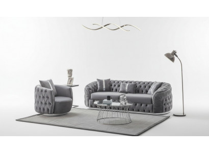 Das Sofa mit Sessel ergänzt die Einrichtung mit Ästhetik und Stil.