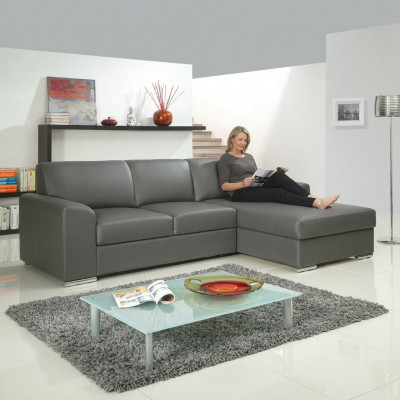 Innovatioun am Wunnzëmmer Ecksofaen mat Stoffpolsterung an auszéierbarer Schloffonktion.